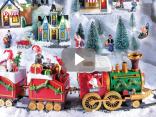 Train de Noël en gros : lumières dans la vitrine