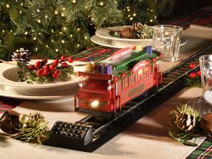 Tren navideño con luces en movimiento.