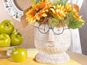 Vase à fleurs avec visage