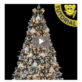 Cómo decorar un árbol en dorado y negro